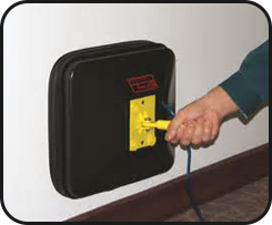 Man Plugging in Equipment 