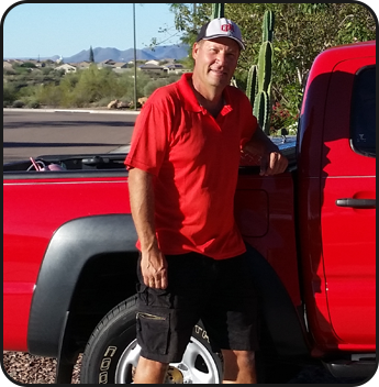 Owner Ken Kucera Standing Next to a Work Truck Owner Ken Kucera Standing Next to a Work Truck